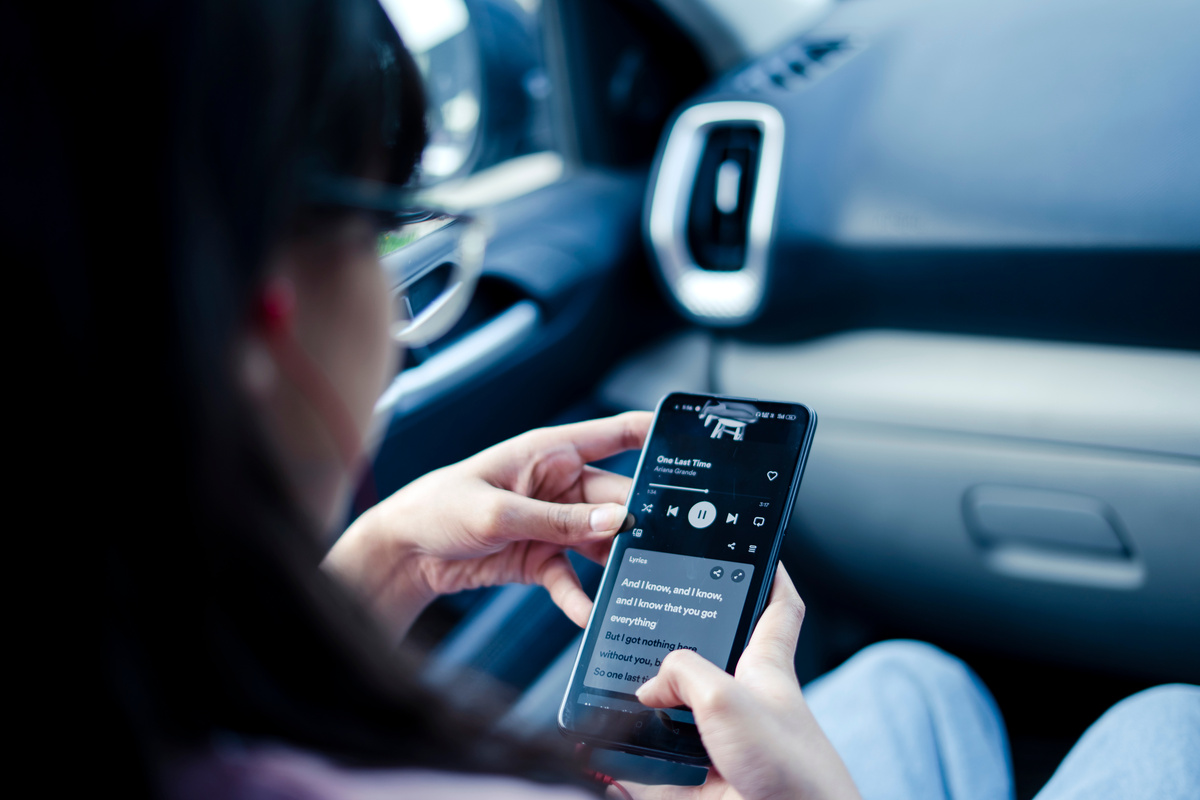 Girl listening music in car