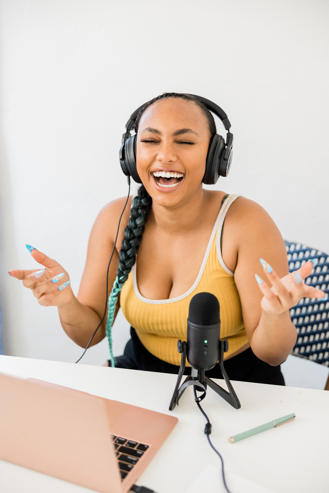 Woman Recording a Podcast at Home